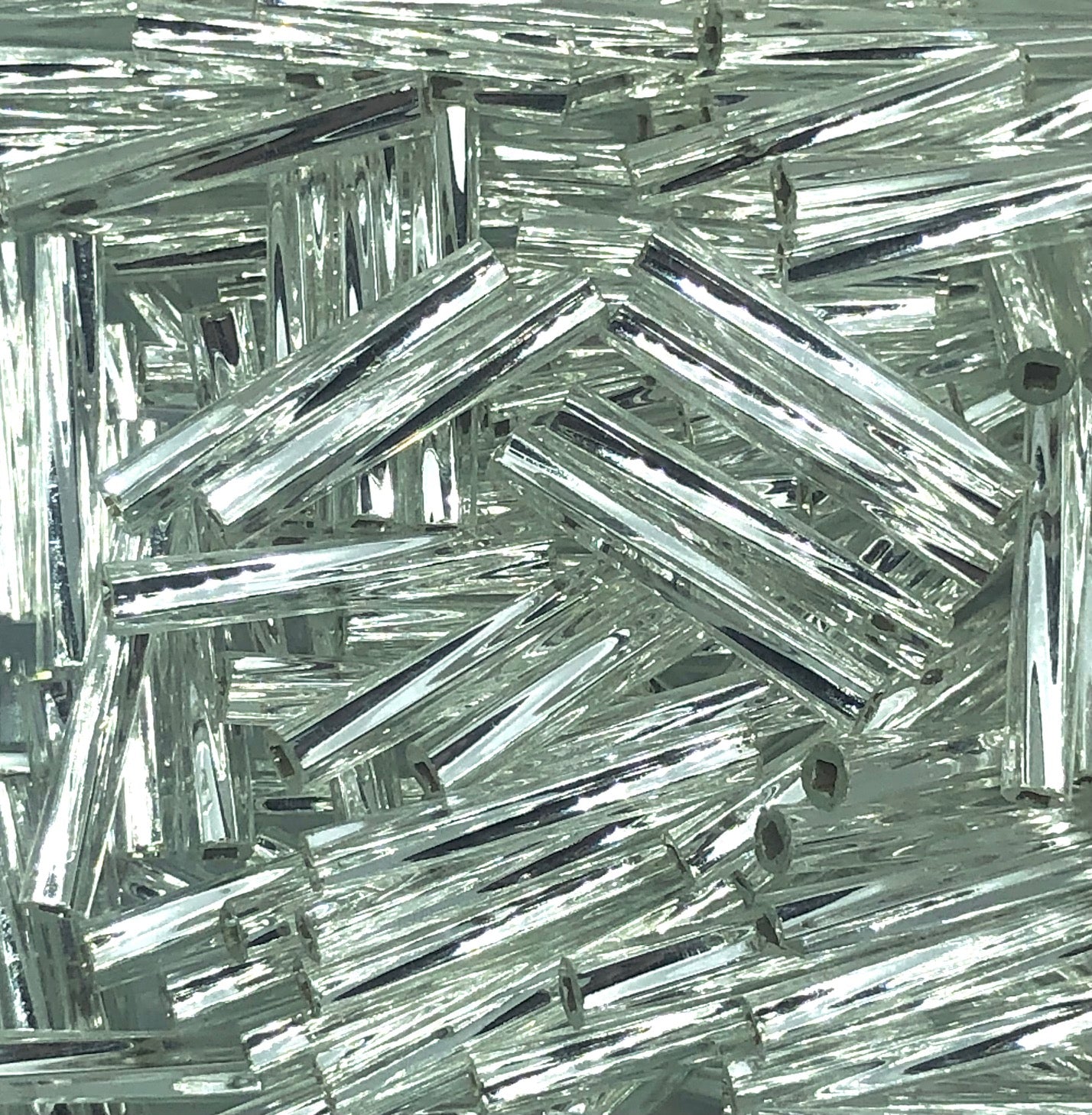 #1 Twisted Bugle 12mm Silver Lined Crystal Clear