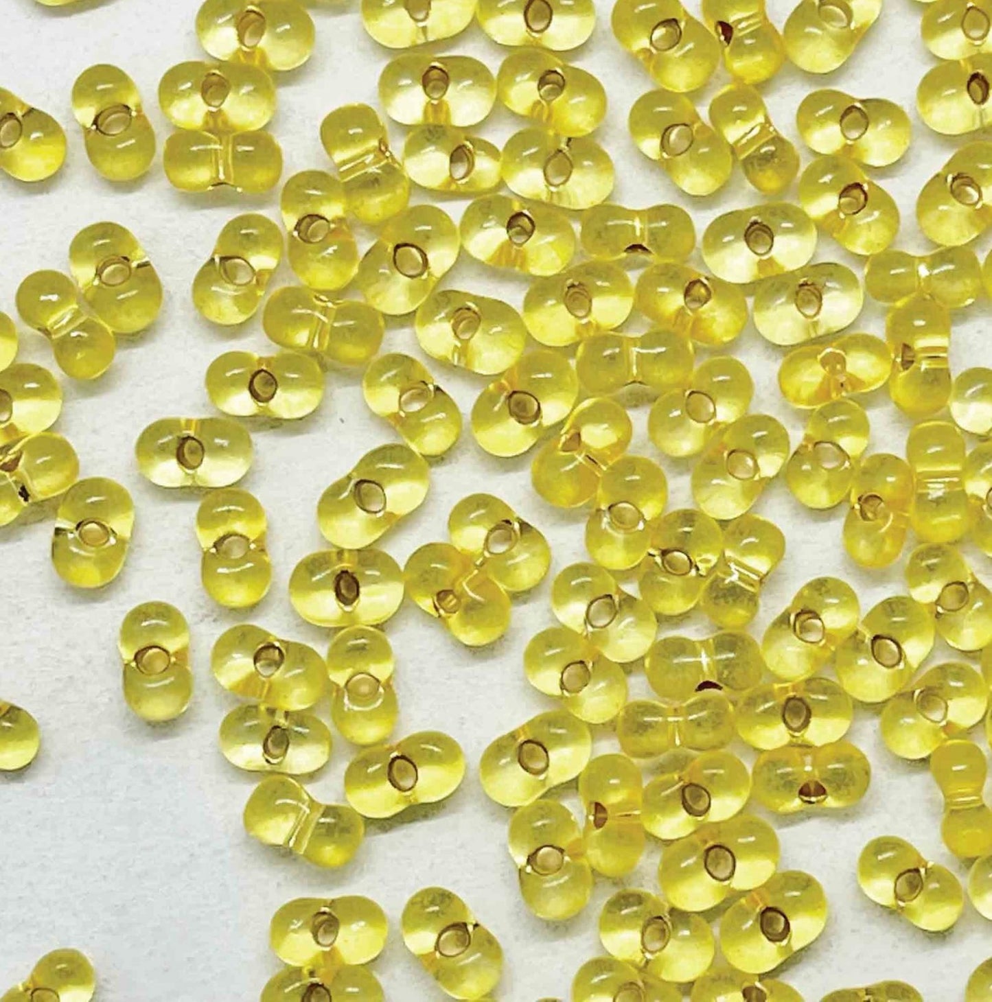 78181 Silver Lined Yellow 2X4mm Farfalle 10 grams